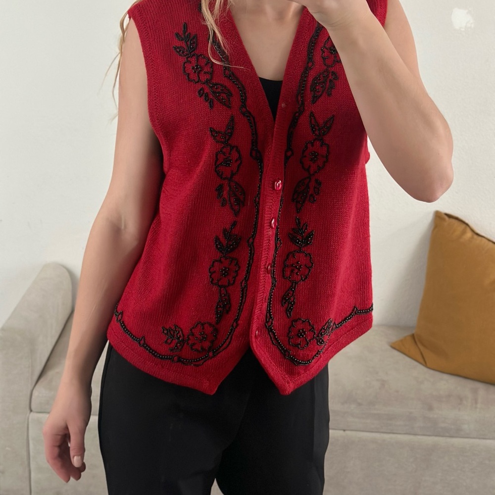 beaded vest with floral design.